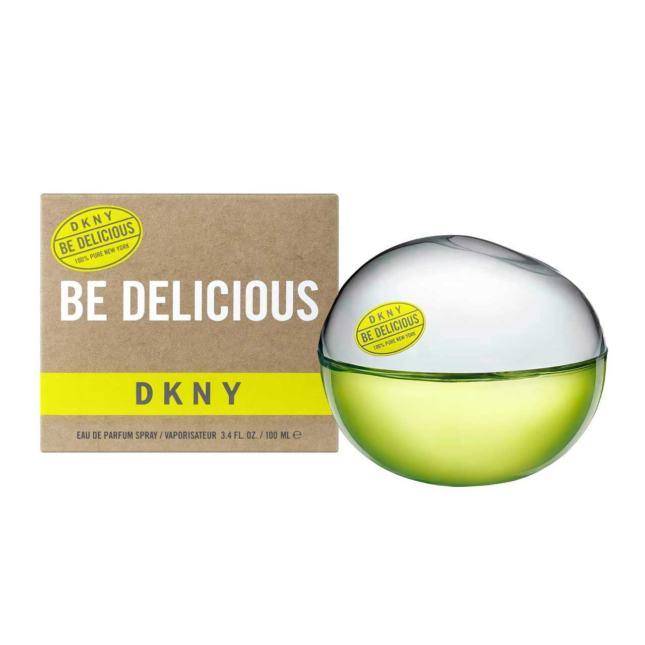 Un frasco de DKNY BE DELICIOUS EDP WOMAN 100 ML, en forma de manzana con un tinte verde y tapón plateado, se encuentra junto a su caja marrón y verde con el logotipo. Vendido por DarlynS Perfumería y Accesorios.