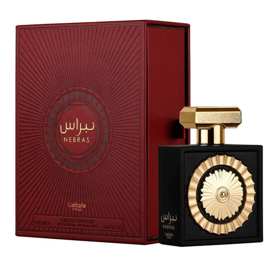 Un frasco de LATTAFA NEBRAS EDP 100 ML de DarlynS Perfumería y Accesorios, en negro y dorado, está junto a su caja a juego en rojo y dorado repujado con texto en árabe e inglés.